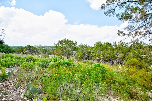 a view of a house with a street