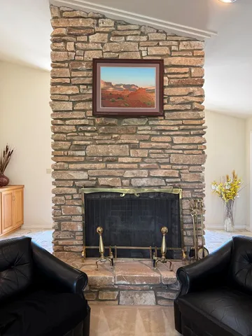 a kitchen with a refrigerator and a sink