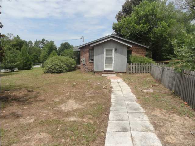4431 Antioch Road Crestview, FL 32536 - Photo 3 of 7 a view of backyard with large trees and wooden fence