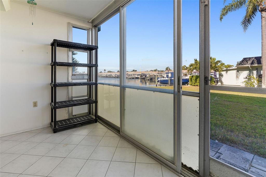 1 Boca Ciega Point Boulevard, Unit 113 St. Petersburg, FL 33708 - Photo 20 of 36 a view of a balcony with city view