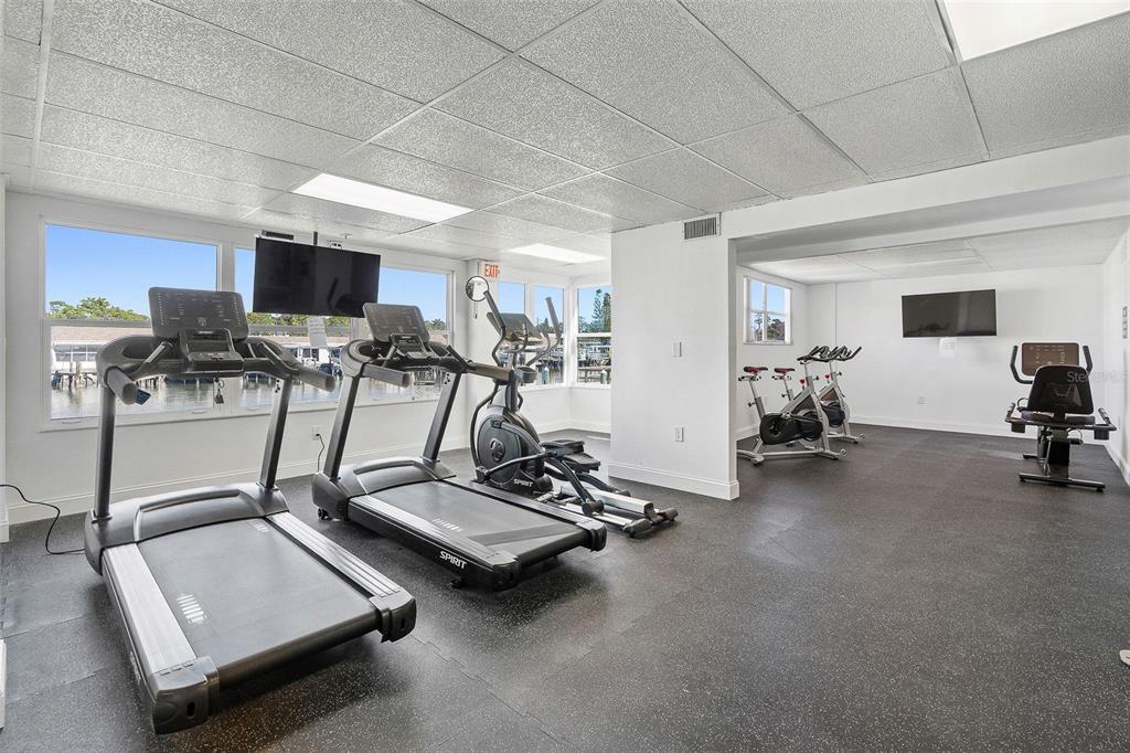 1 Boca Ciega Point Boulevard, Unit 113 St. Petersburg, FL 33708 - Photo 30 of 36 a view of a room with gym equipment