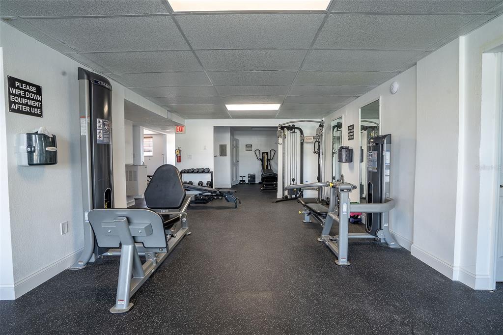 1 Boca Ciega Point Boulevard, Unit 113 St. Petersburg, FL 33708 - Photo 32 of 36 a living room with furniture