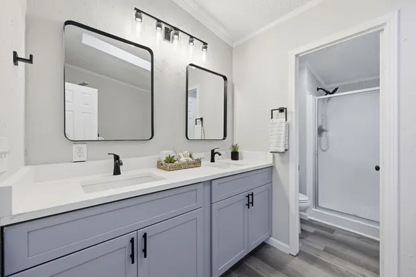 a bathroom with a sink and a shower