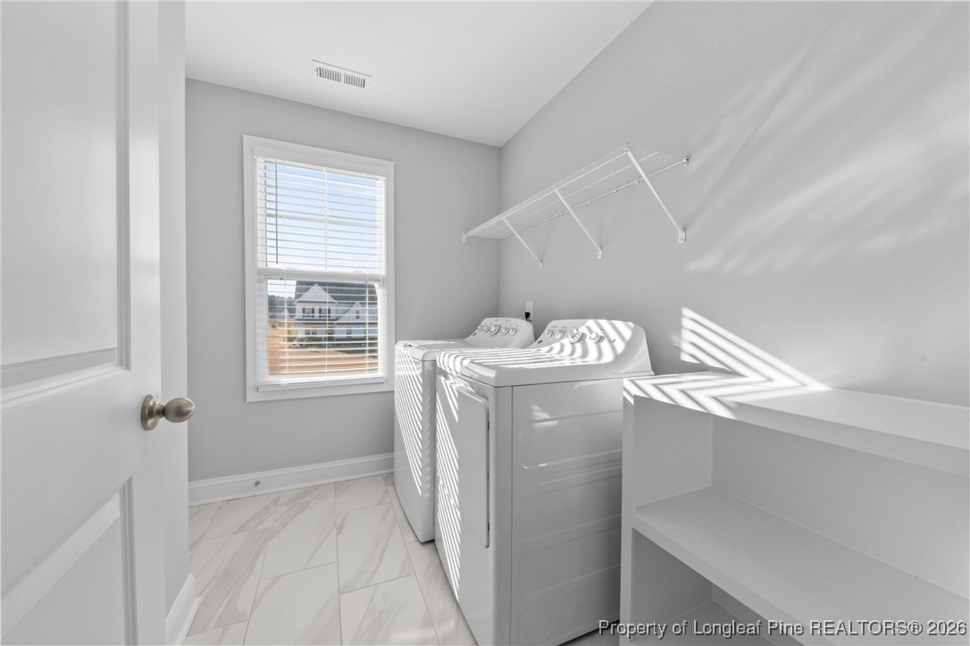 298 Turkey Trot Lane Raeford, NC 28376 - Photo 20 of 43 a utility room with dryer and washer