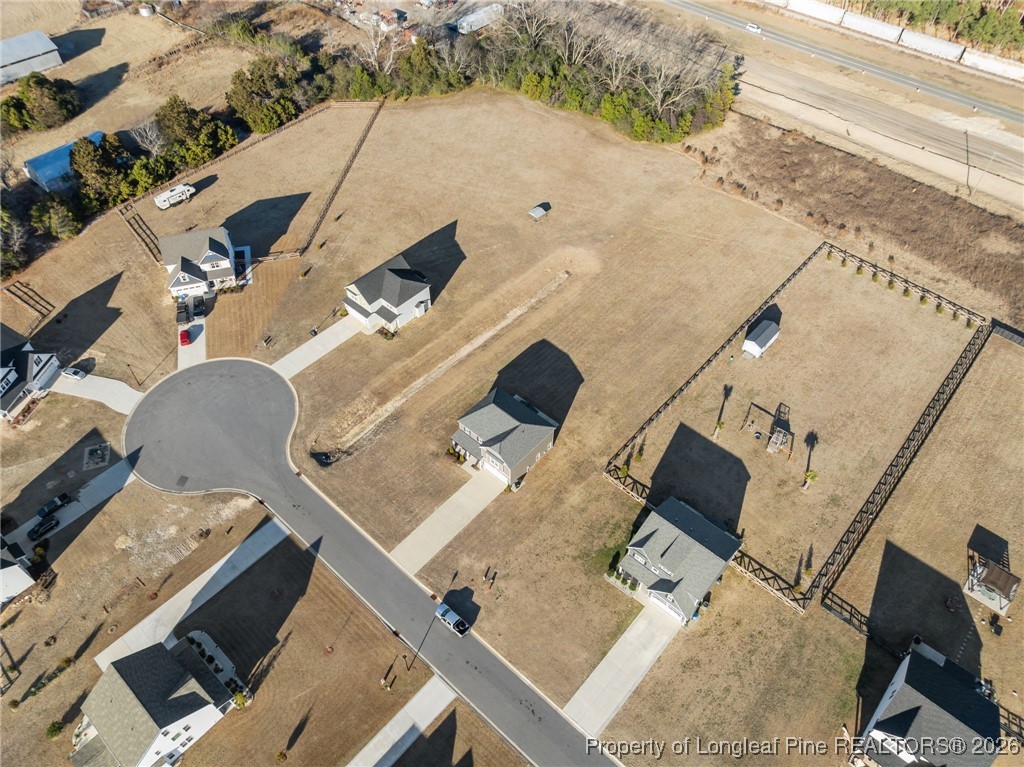 298 Turkey Trot Lane Raeford, NC 28376 - Photo 29 of 43 an aerial view of residential houses with outdoor space