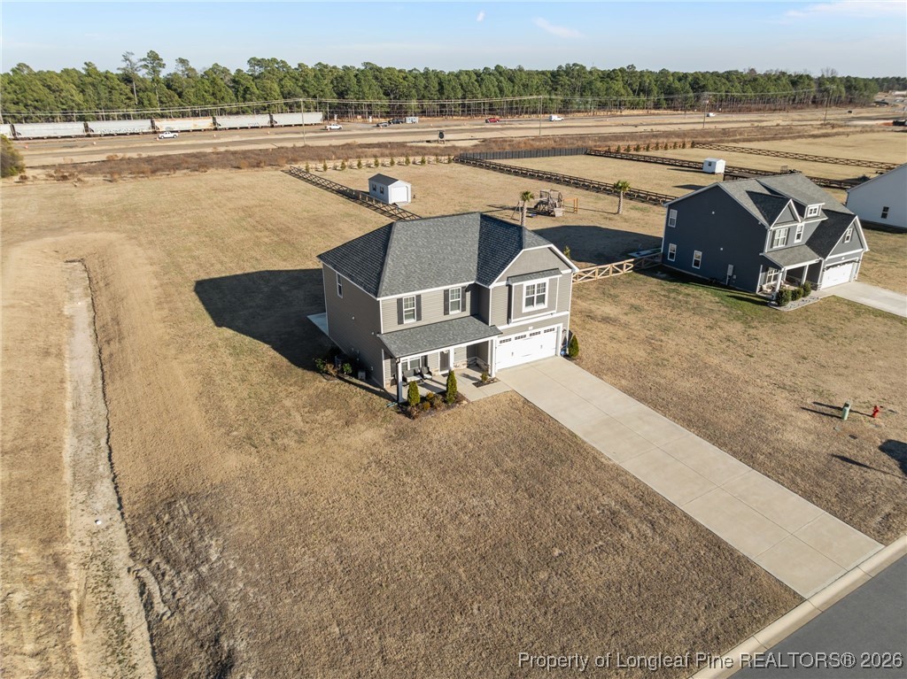 298 Turkey Trot Lane Raeford, NC 28376 - Photo 30 of 43 a view of a patio with lawn chairs and ocean view