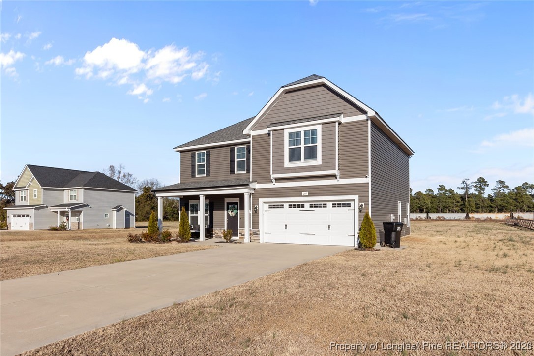 298 Turkey Trot Lane Raeford, NC 28376 - Photo 37 of 43 a front view of a house with a yard