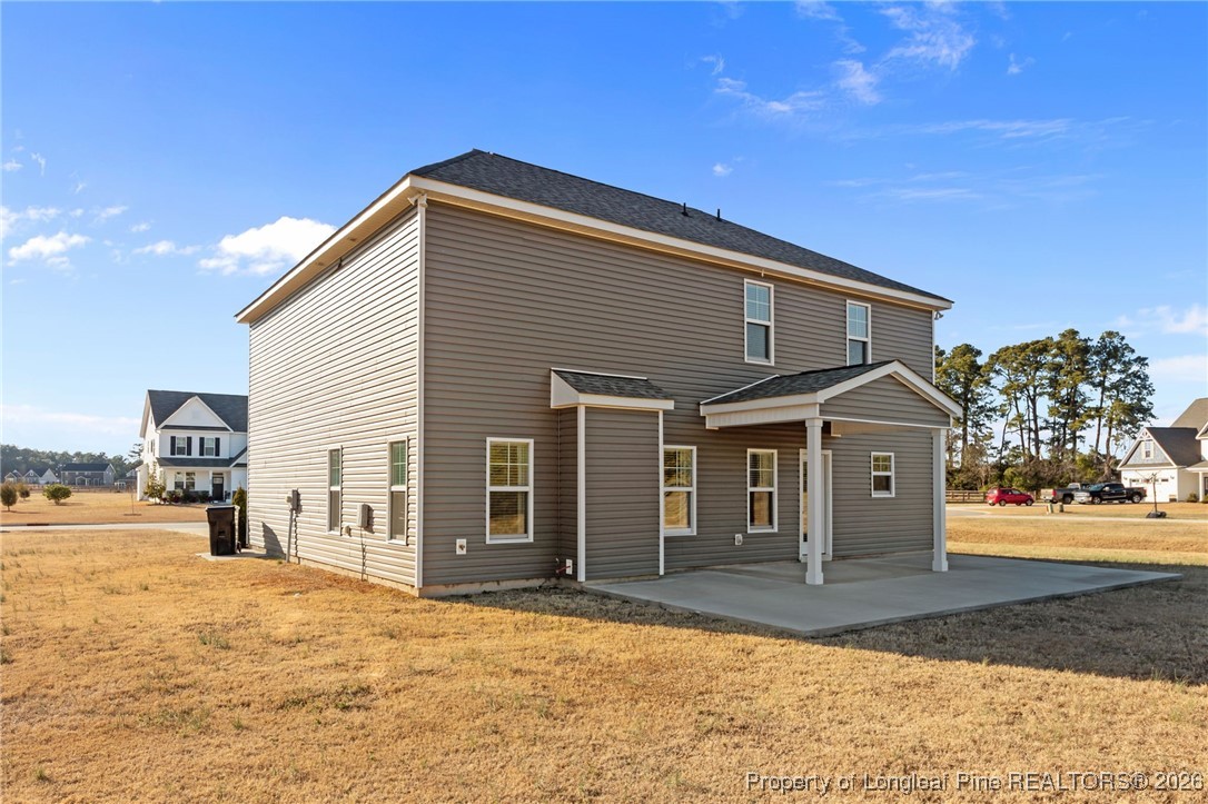298 Turkey Trot Lane Raeford, NC 28376 - Photo 42 of 43 a front view of a house with a yard