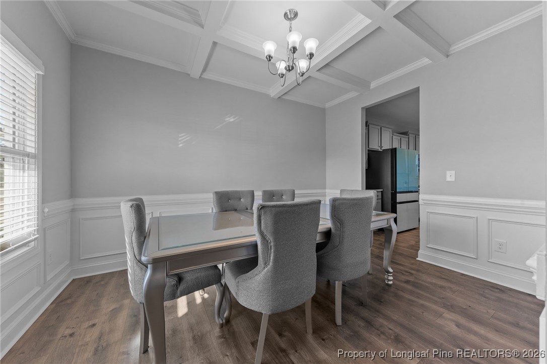 298 Turkey Trot Lane Raeford, NC 28376 - Photo 6 of 43 a view of a dining room with furniture and wooden floor