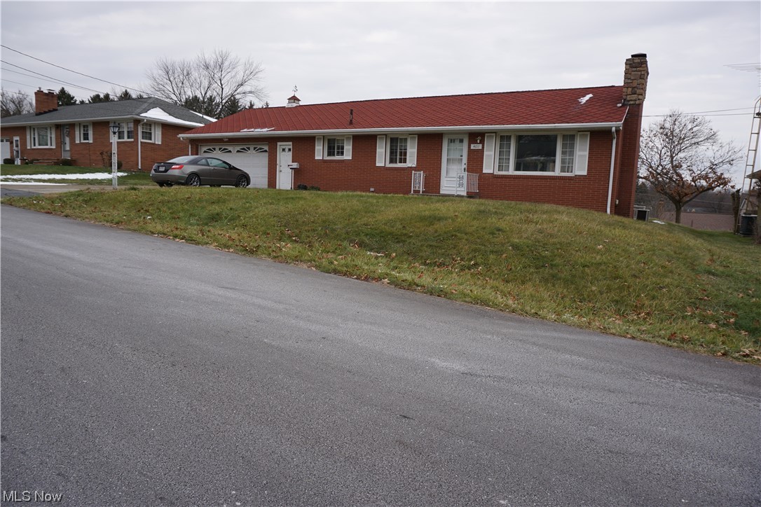 4611 8th Street Northwest Canton, OH 44708 - Photo 29 of 29 Single story home featuring a garage and a front lawn