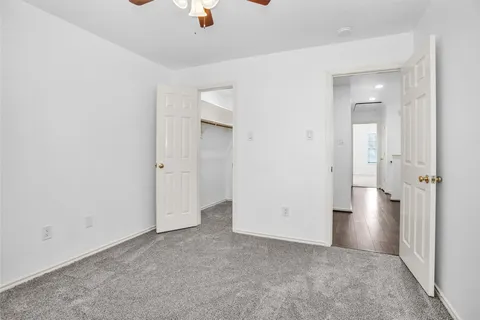 an empty room with a bathroom