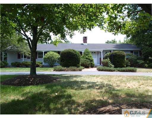 7 Cleveland Road Princeton, NJ 08540 - Photo 1 of 24 a front view of a house with a yard