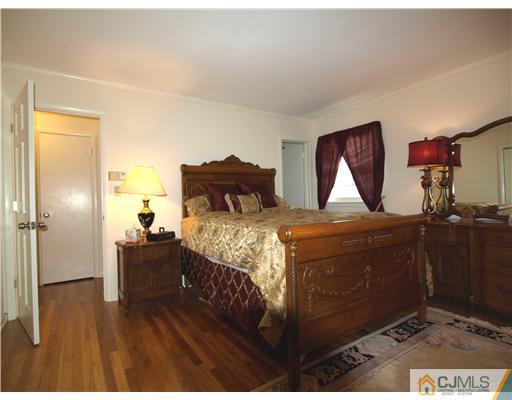 7 Cleveland Road Princeton, NJ 08540 - Photo 12 of 24 a bed room with a bed and a television