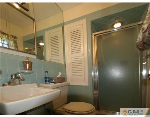 7 Cleveland Road Princeton, NJ 08540 - Photo 13 of 24 a bathroom with a sink toilet and shower