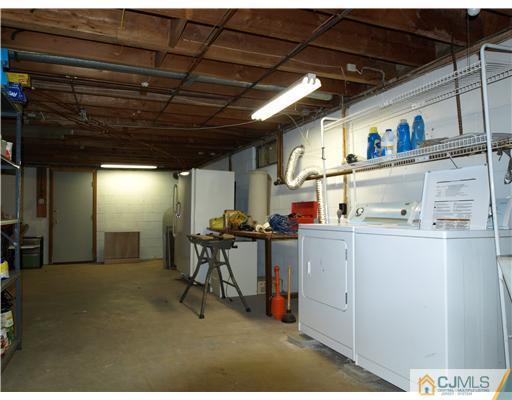 7 Cleveland Road Princeton, NJ 08540 - Photo 18 of 24 a storage room with washer and dryer