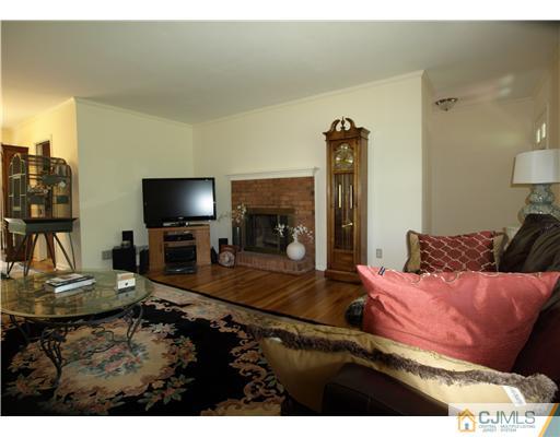 7 Cleveland Road Princeton, NJ 08540 - Photo 6 of 24 a living room with furniture and a flat screen tv