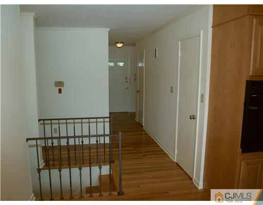 7 Cleveland Road Princeton, NJ 08540 - Photo 8 of 24 a view of hallway with wooden floor