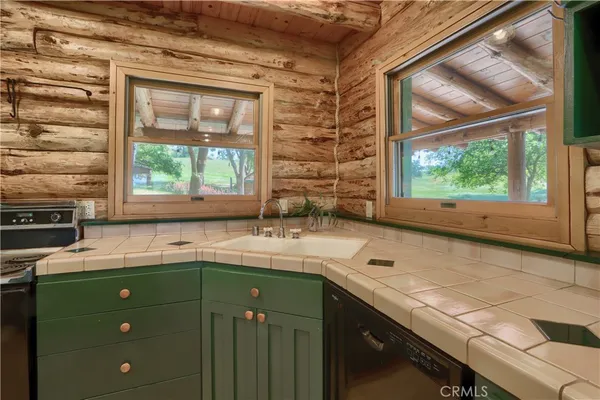 a spacious bedroom with a bed and a window