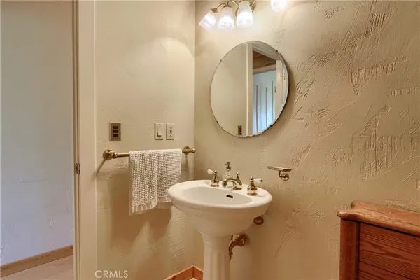 a room with a stove and a sink