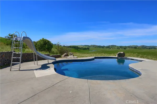 a view of a lush green field
