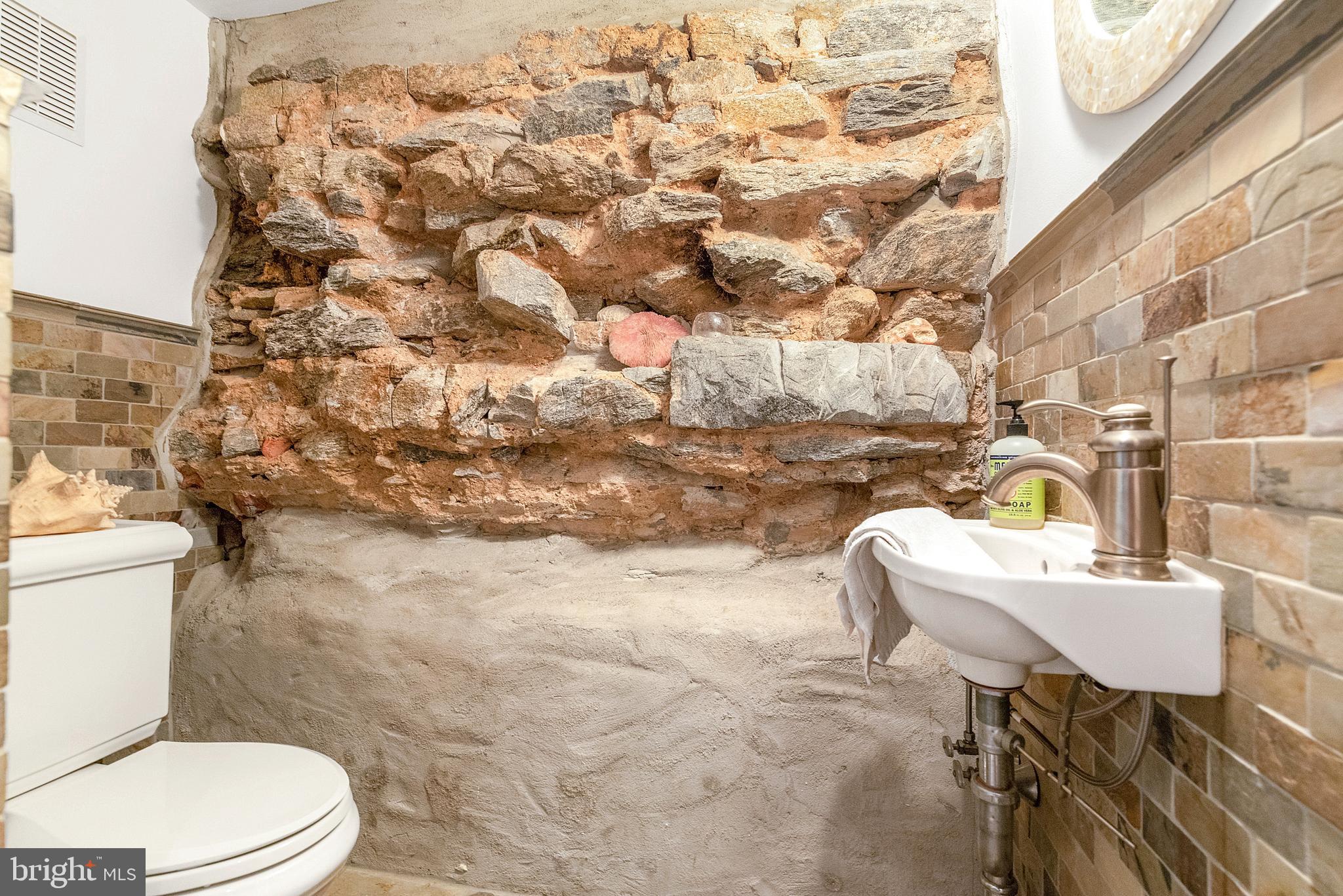 608 South 9th Street, Unit 1 Philadelphia, PA 19147 - Photo 11 of 23 a bathroom with a sink toilet and shower