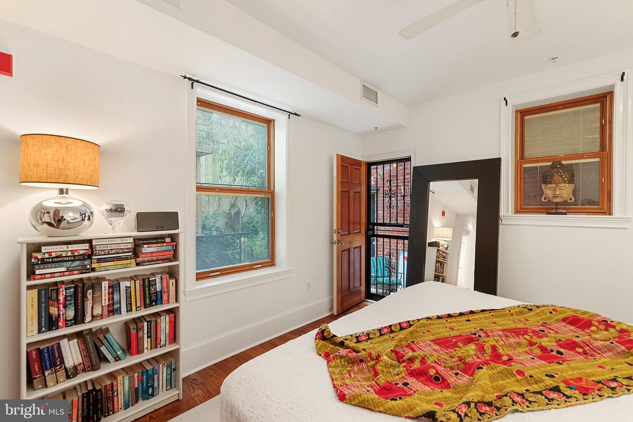 608 South 9th Street, Unit 1 Philadelphia, PA 19147 - Photo 12 of 23 a bedroom with a bed and a window