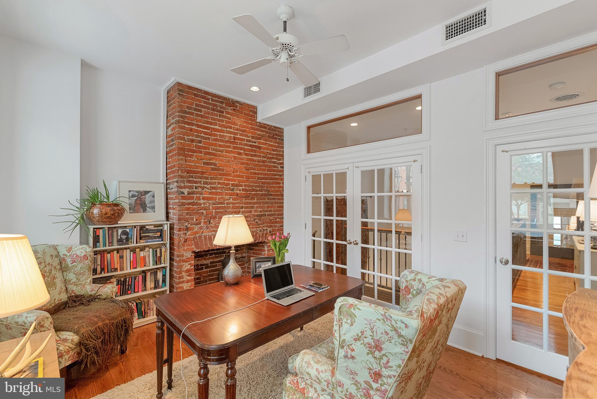 608 South 9th Street, Unit 1 Philadelphia, PA 19147 - Photo 20 of 23 a workspace with furniture and a book shelf