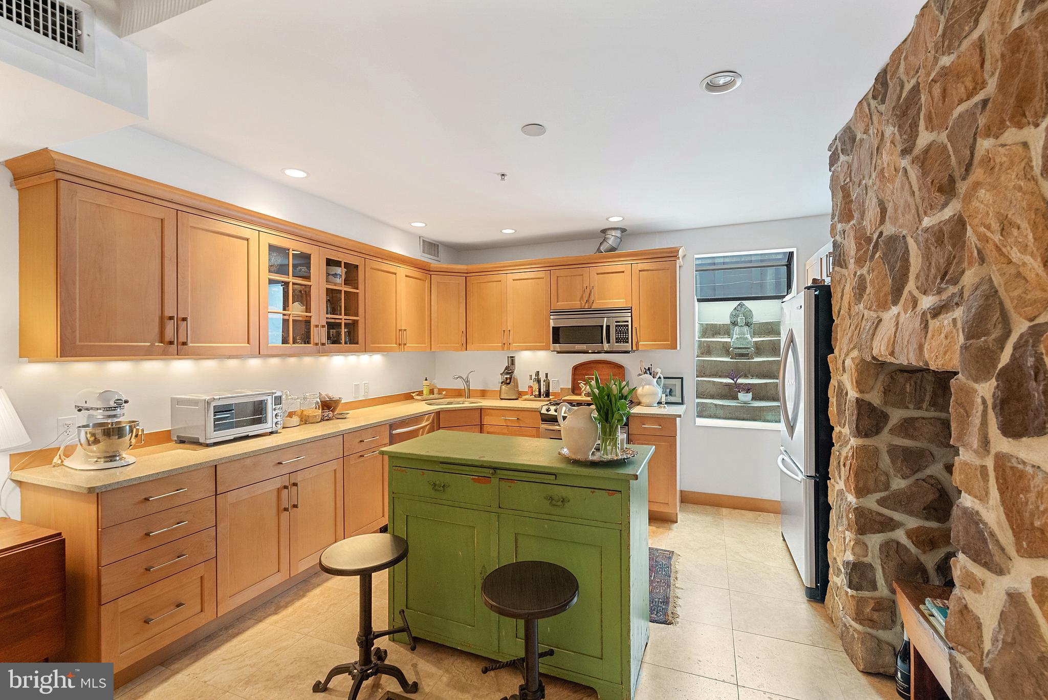 608 South 9th Street, Unit 1 Philadelphia, PA 19147 - Photo 6 of 23 a kitchen with a sink and cabinets