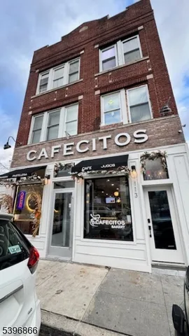 a building with a stove and cabinets