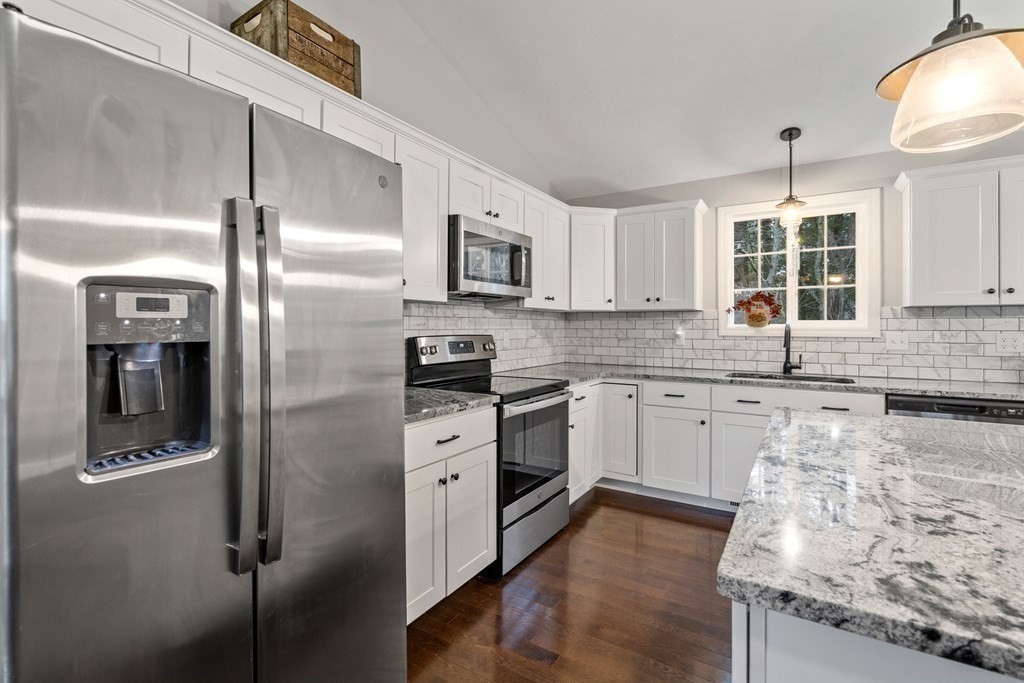 143 North Brookfield Road Barre, MA 01005 - Photo 11 of 31 a kitchen with granite countertop a refrigerator and a sink