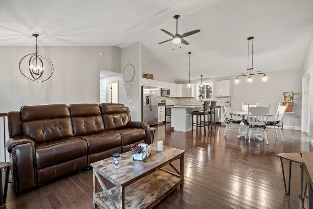 143 North Brookfield Road Barre, MA 01005 - Photo 18 of 31 a living room with furniture kitchen view and a chandelier
