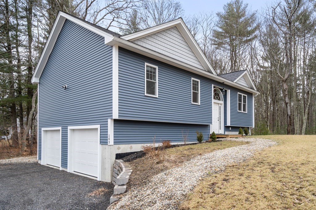 143 North Brookfield Road Barre, MA 01005 - Photo 2 of 31 a front view of a house with a yard
