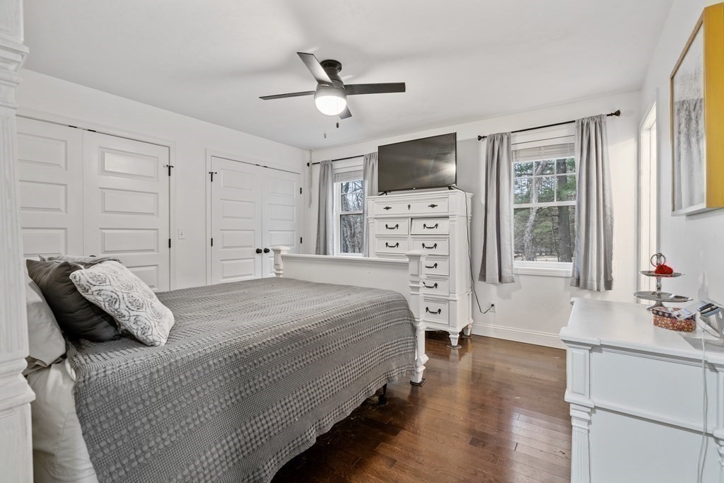 143 North Brookfield Road Barre, MA 01005 - Photo 22 of 31 a spacious bedroom with a bed and a flat screen tv
