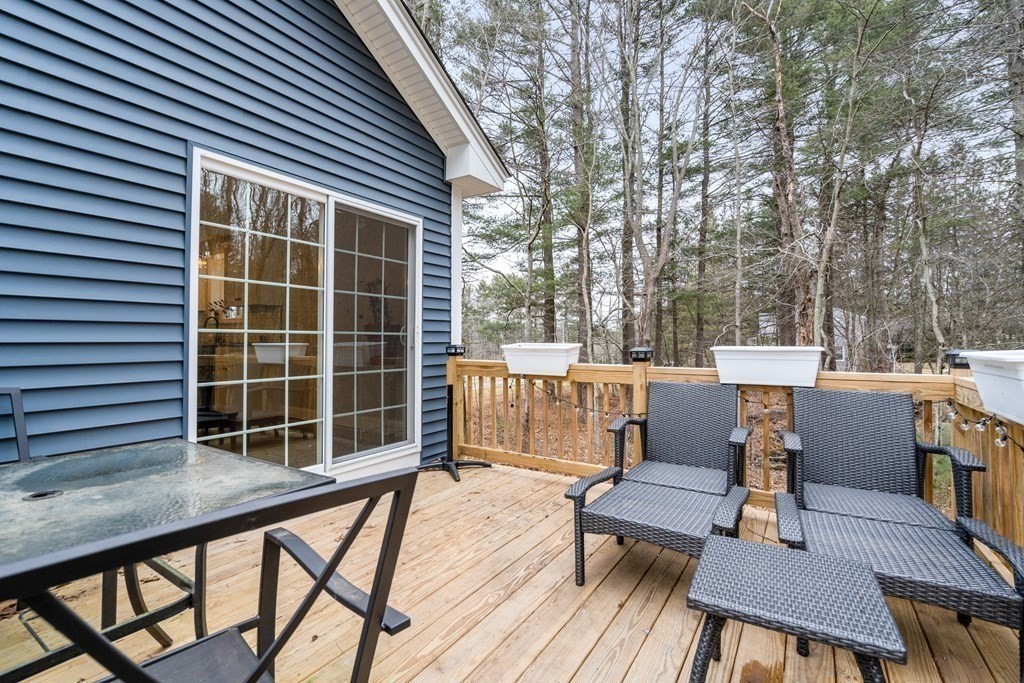 143 North Brookfield Road Barre, MA 01005 - Photo 8 of 31 a view of a patio with a bench