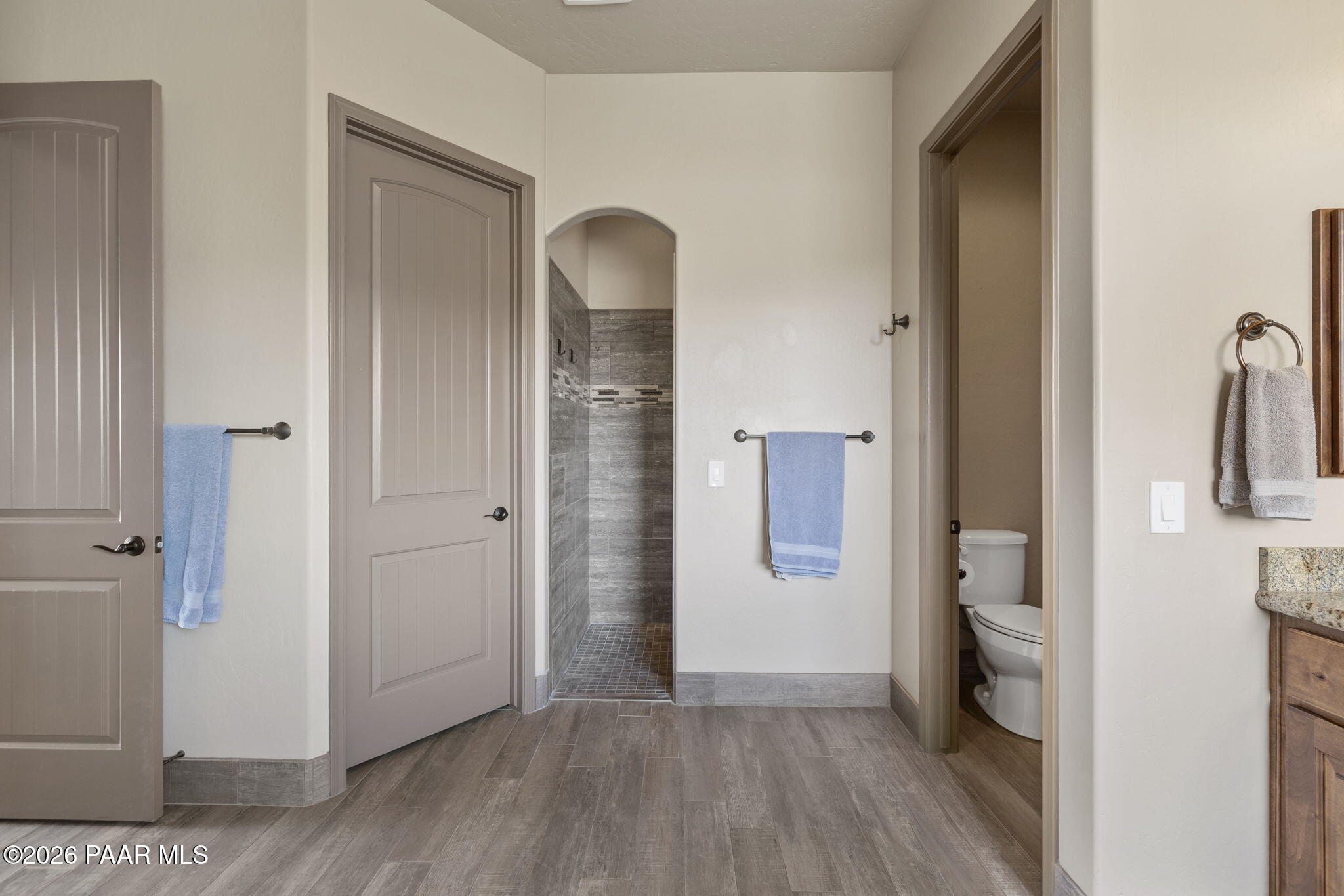 14141 Cassidy Trail Prescott Valley, AZ 86315 - Photo 20 of 44 a view of bathroom with a toilet a sink and a mirror