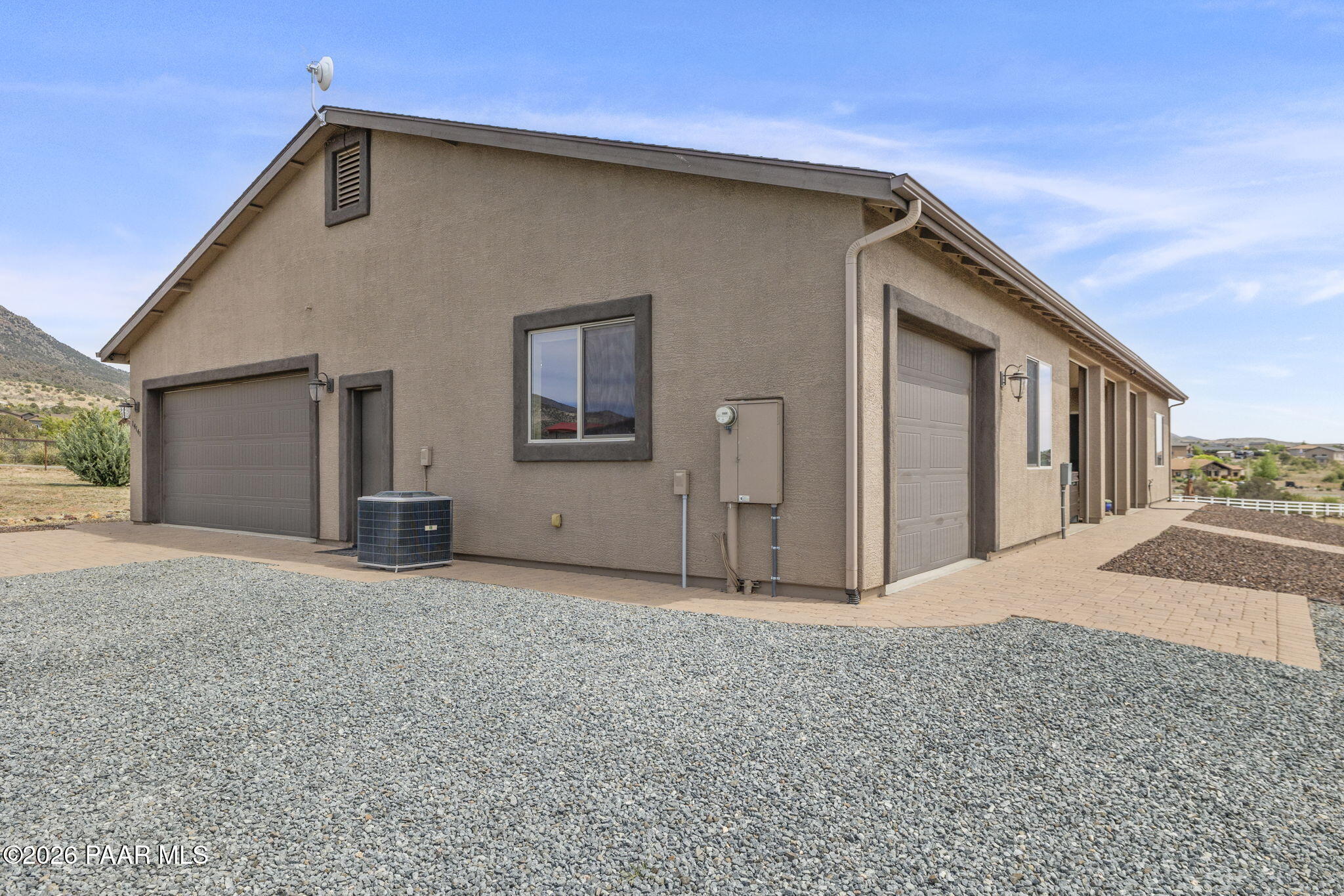 14141 Cassidy Trail Prescott Valley, AZ 86315 - Photo 31 of 44 a view of a house with a backyard