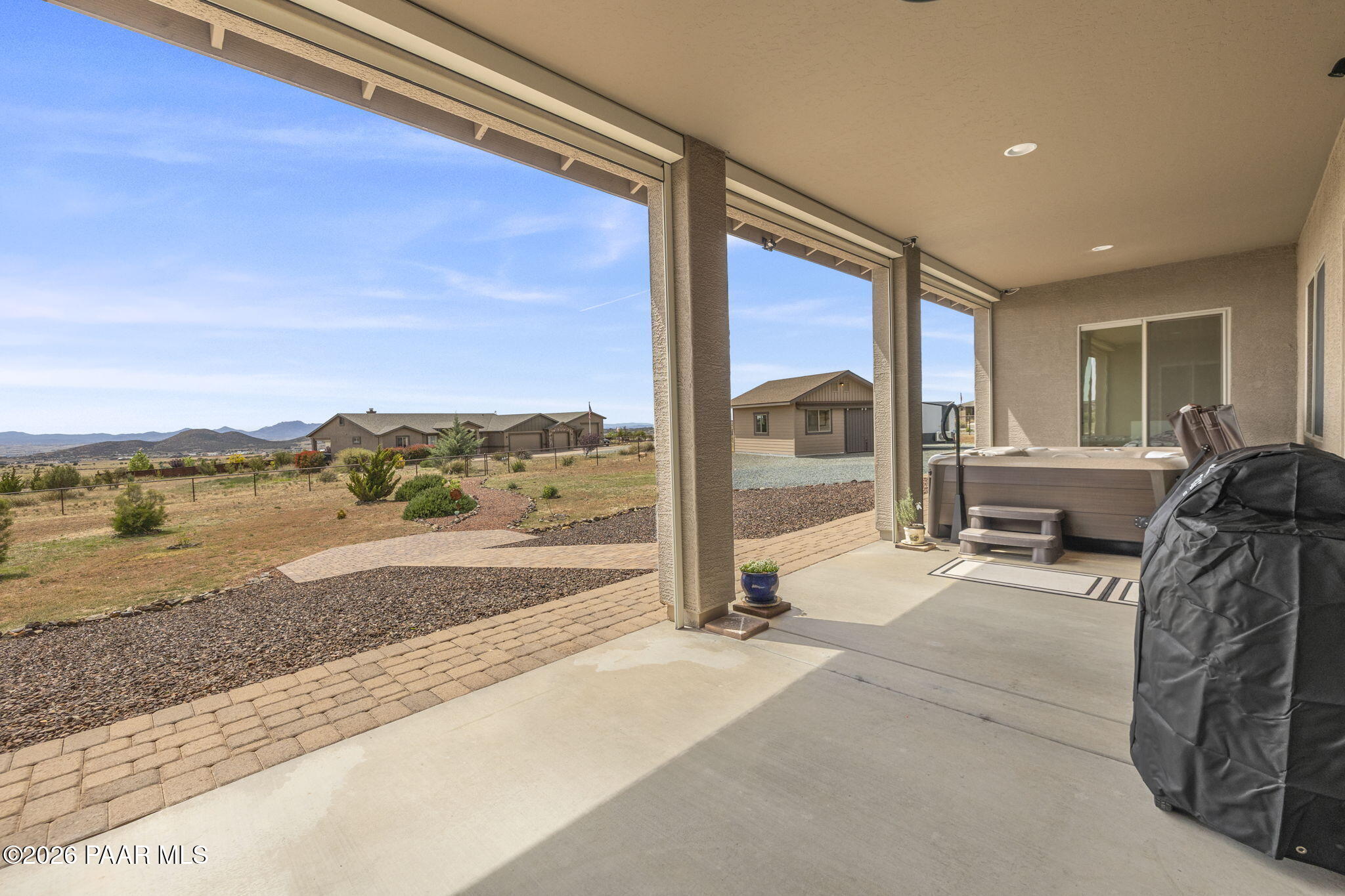 14141 Cassidy Trail Prescott Valley, AZ 86315 - Photo 33 of 44 a view of a balcony with table and chairs