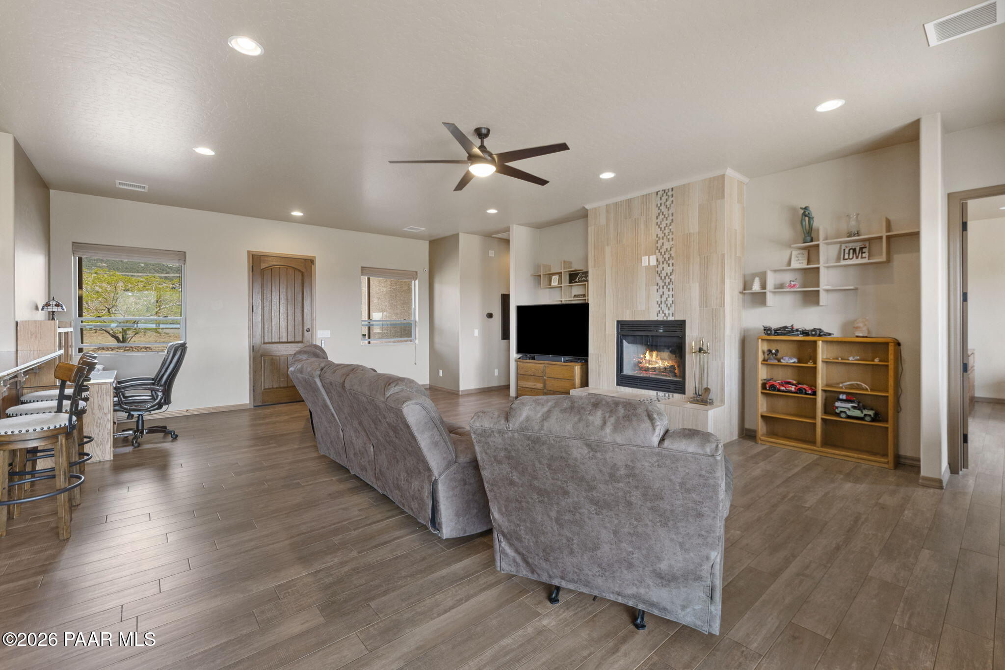 14141 Cassidy Trail Prescott Valley, AZ 86315 - Photo 4 of 44 a living room with furniture and a flat screen tv