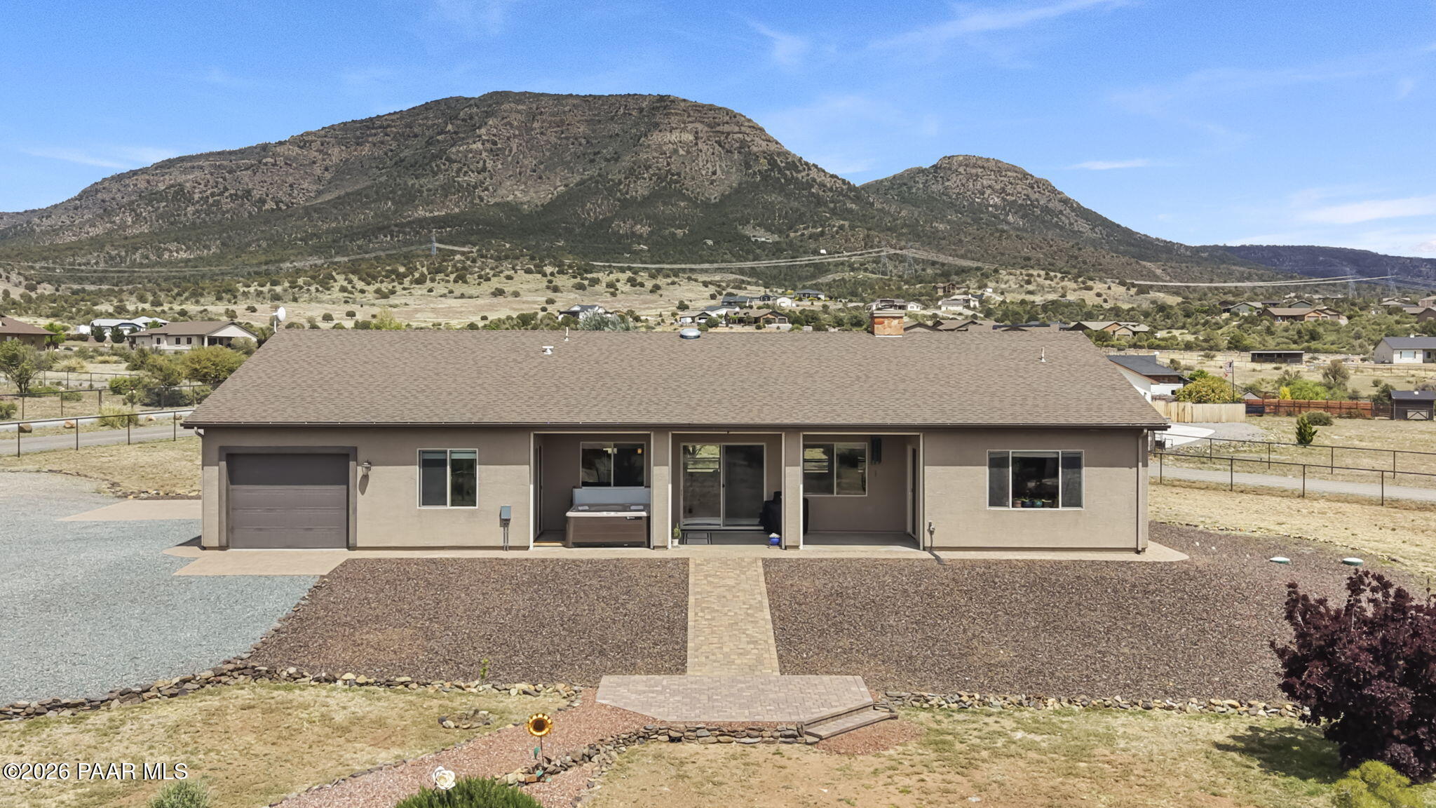 14141 Cassidy Trail Prescott Valley, AZ 86315 - Photo 41 of 44 a front view of a house with a yard