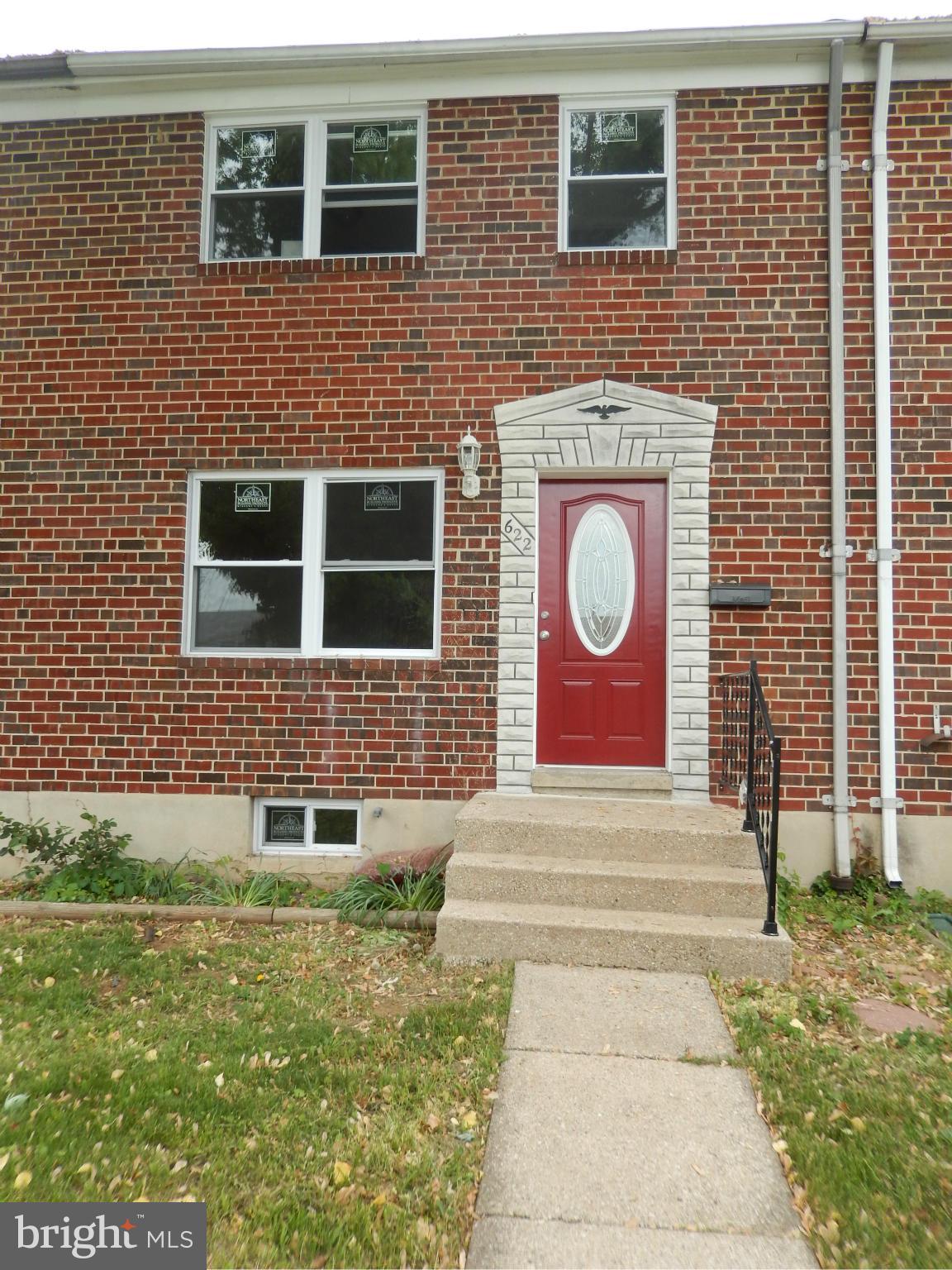 622 Charraway Road Baltimore, MD 21229 - Photo 1 of 28 a brick house with four windows