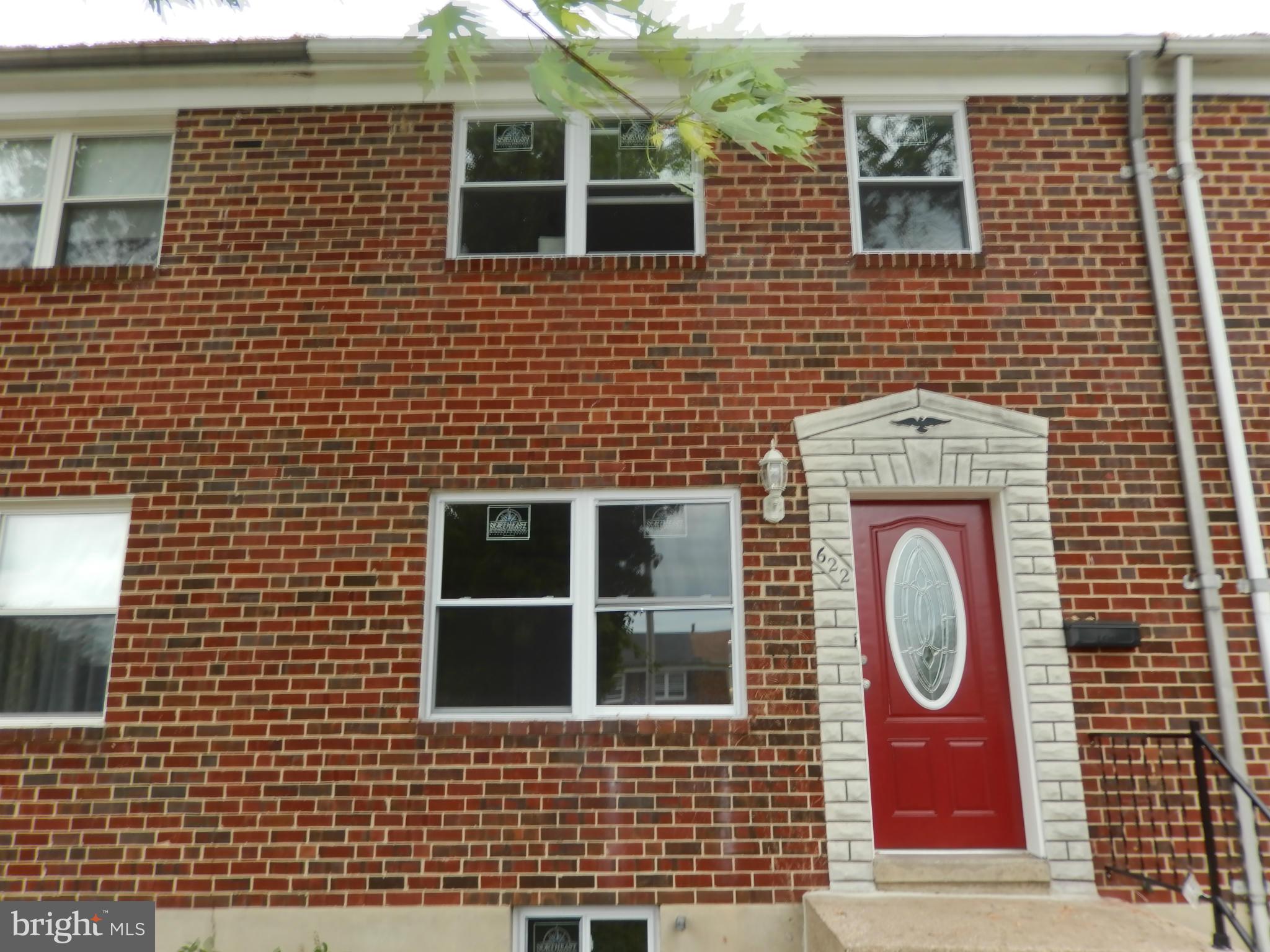 622 Charraway Road Baltimore, MD 21229 - Photo 2 of 28 a brick building with a door