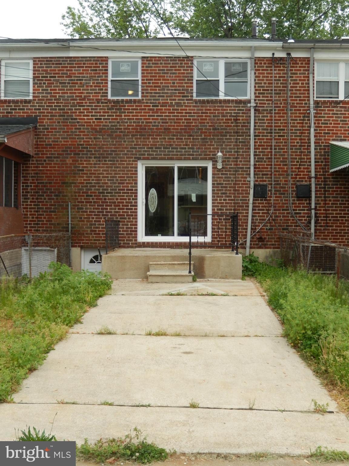 622 Charraway Road Baltimore, MD 21229 - Photo 27 of 28 a house with a yard