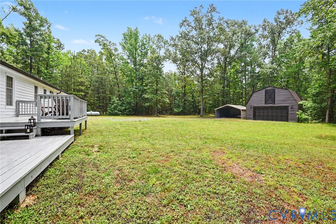 9820 Beaver Bridge Road Chesterfield, VA 23838 - Photo 46 of 54 Expansive rear yard featuring a large gray painted