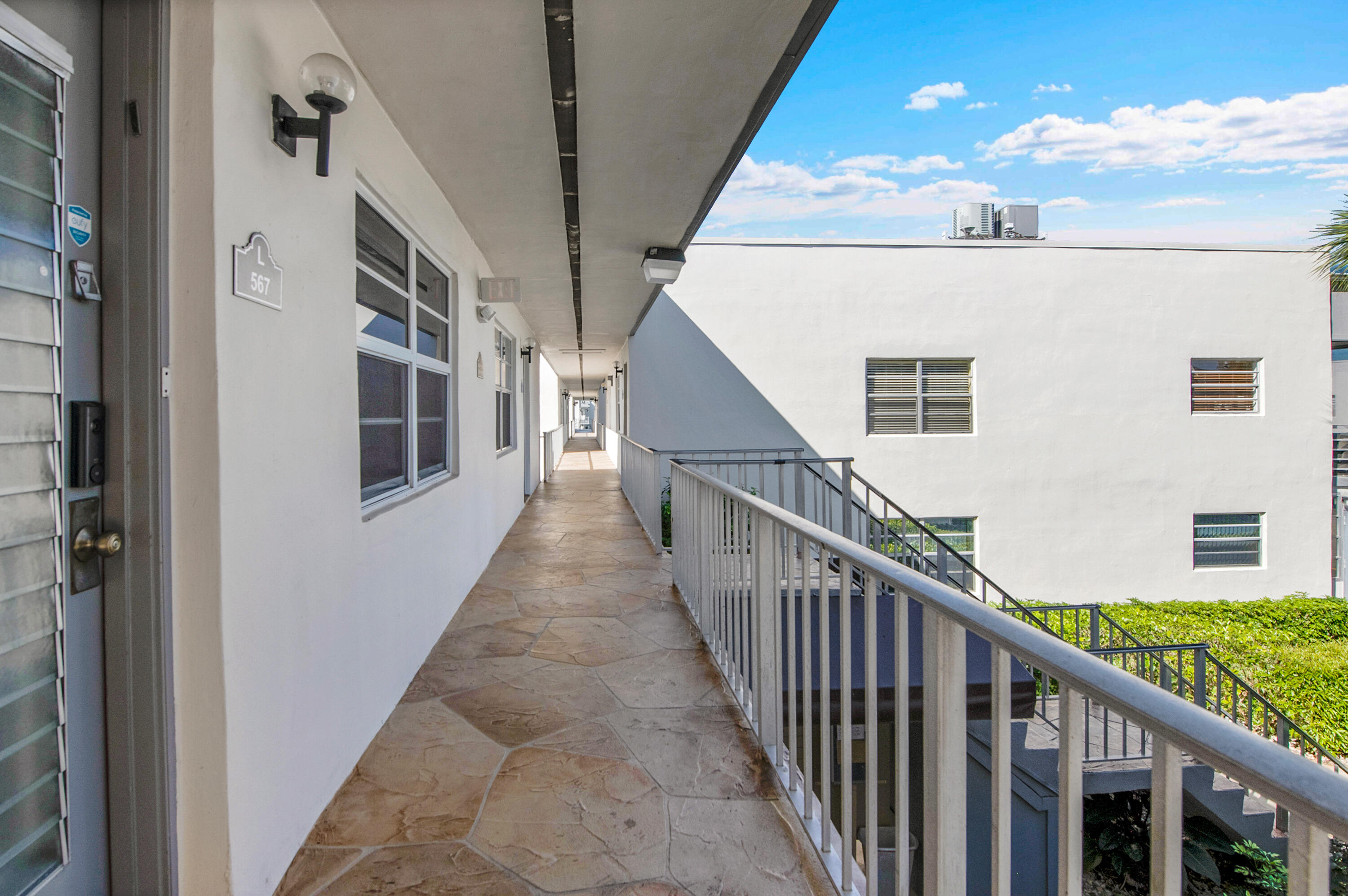 567 Normandy L, Unit 567 Delray Beach, FL 33484 - Photo 24 of 38 Exterior Front Doo