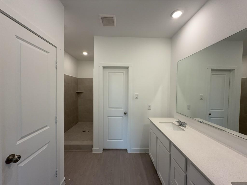 537 Ml Trce Way Princeton, TX 75407 - Photo 16 of 40 a bathroom with a sink and a mirror