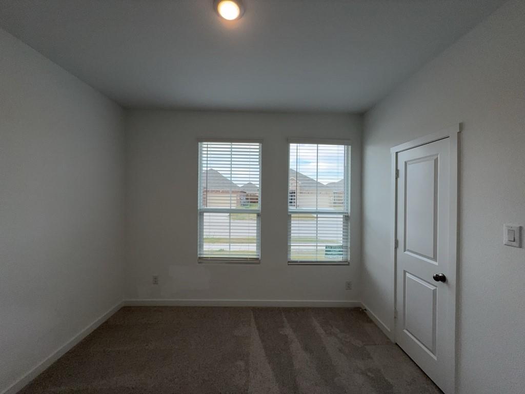 537 Ml Trce Way Princeton, TX 75407 - Photo 23 of 40 an empty room with windows