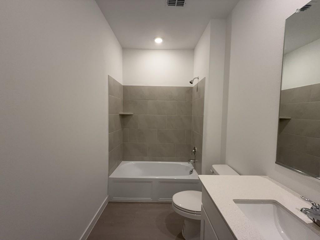 537 Ml Trce Way Princeton, TX 75407 - Photo 29 of 40 a bathroom with a sink and toilet