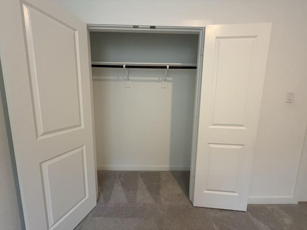 537 Ml Trce Way Princeton, TX 75407 - Photo 36 of 40 a kitchen with a refrigerator and a wooden floor