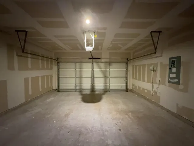 a view of a house with backyard and porch