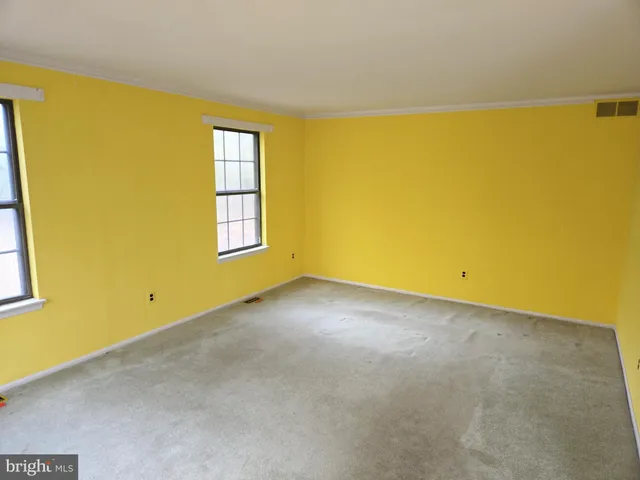 a view of a big room with an empty space